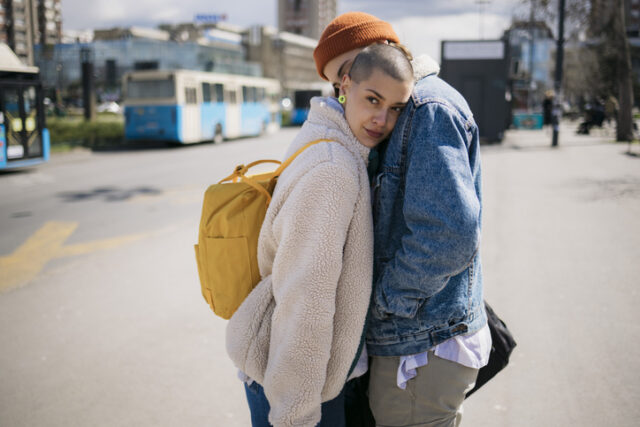 couple embracing on the street