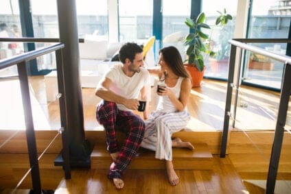 couple having a talk sitting on stoop
