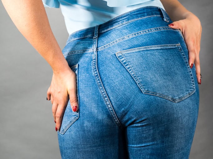 Woman hips in demin jeans.