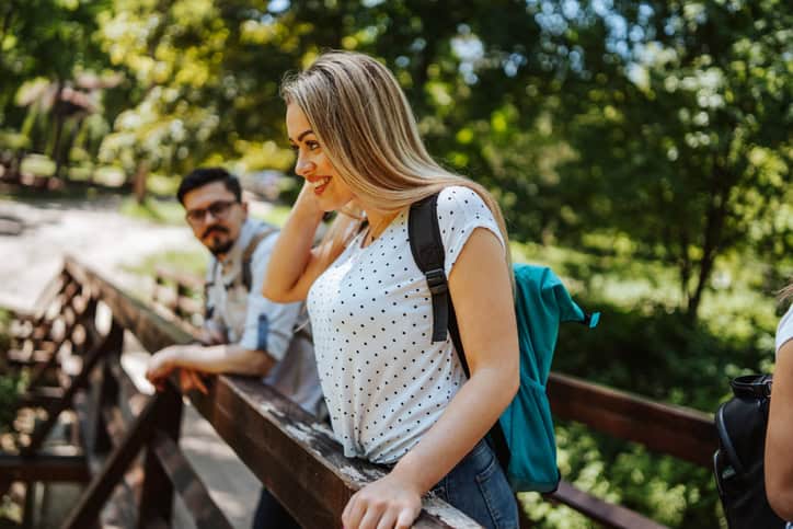 signs a guy likes you as more than a friend