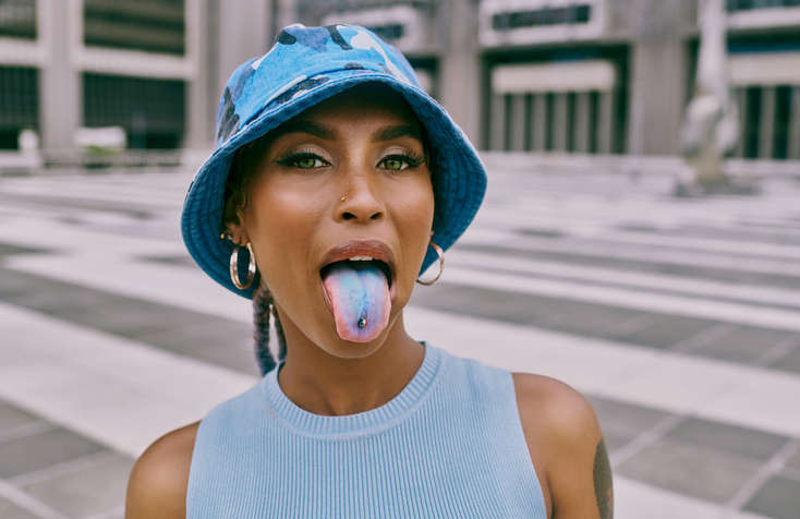 Woman with a blue tongue.