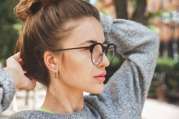 woman wearing reading glasses