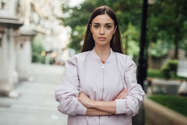 woman arms crossed outside