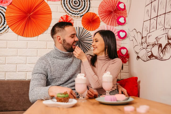 romantic couple on a date with ice cream