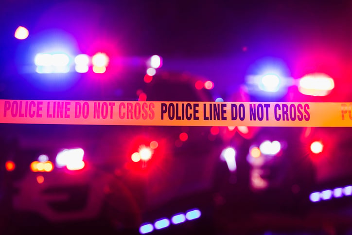 A crime scene with police tape.