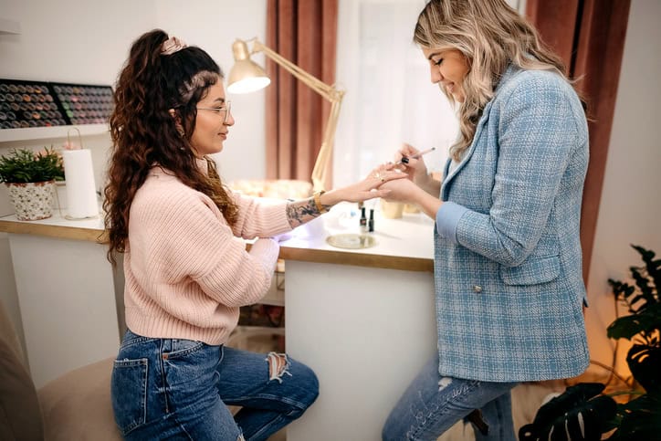 woman getting her nails done