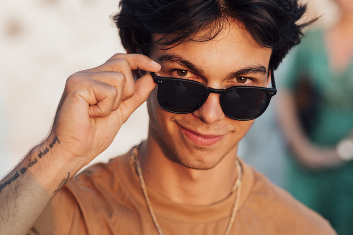 Man wearing black sunglasses.