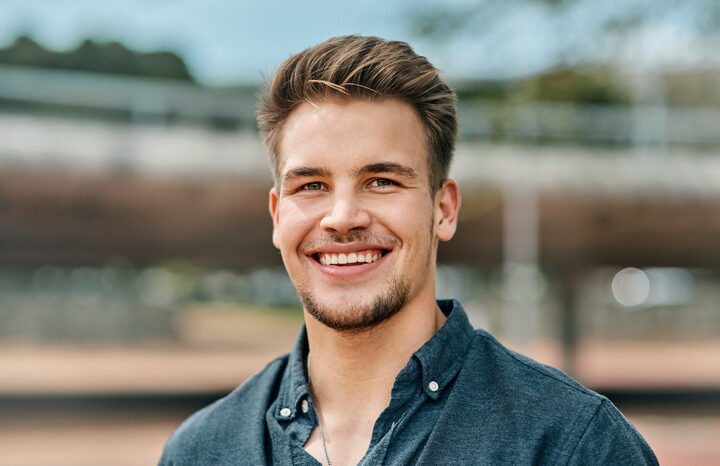 man smiling at the camera