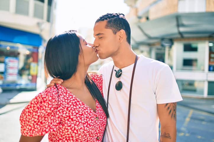 couple kissing in the street