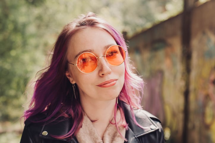 Woman in orange sunglasses.