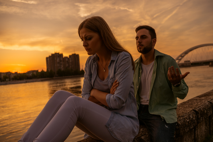 A man engaging in emotional manipulation.