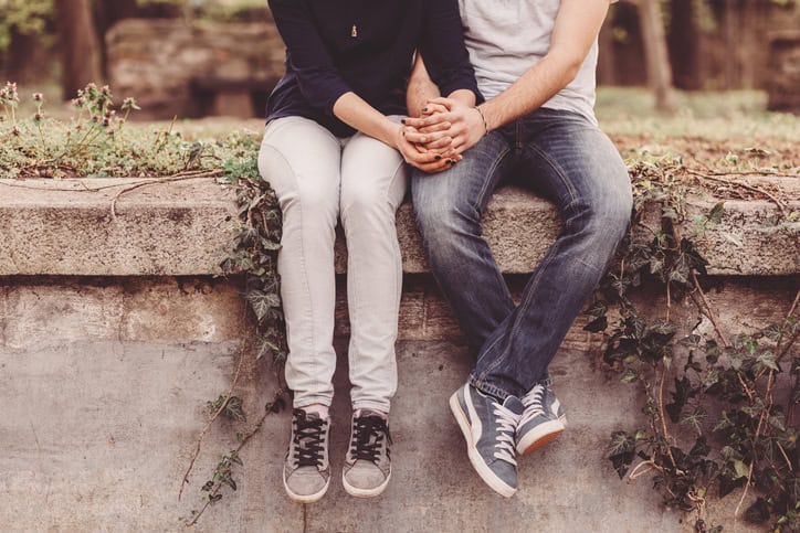 romantic relationship sat on a wall