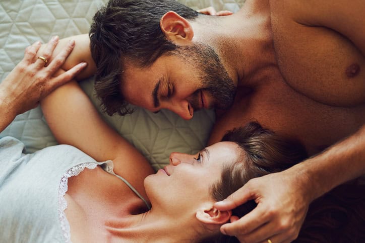 couple laying in bed together