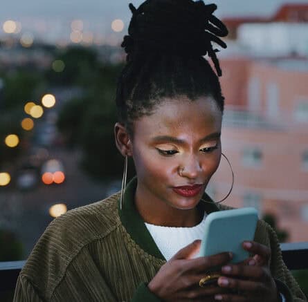 woman texting outside