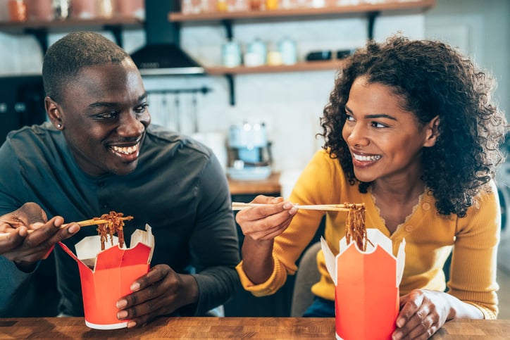 flirty couple enjoying chinese