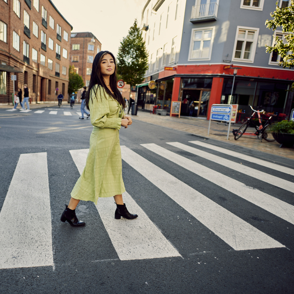 Woman out in the city alone. 