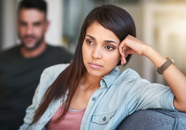 Woman feeling lonely in relationship.