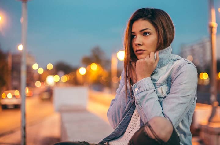 sad girl outside at night
