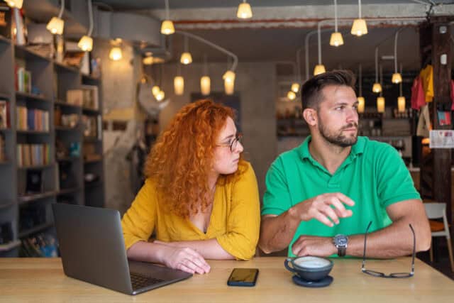 couple arguing at cafe