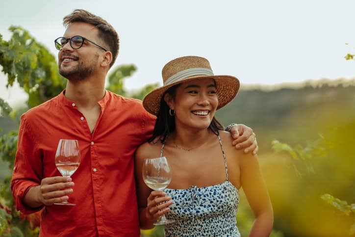 happy couple embracing at winery