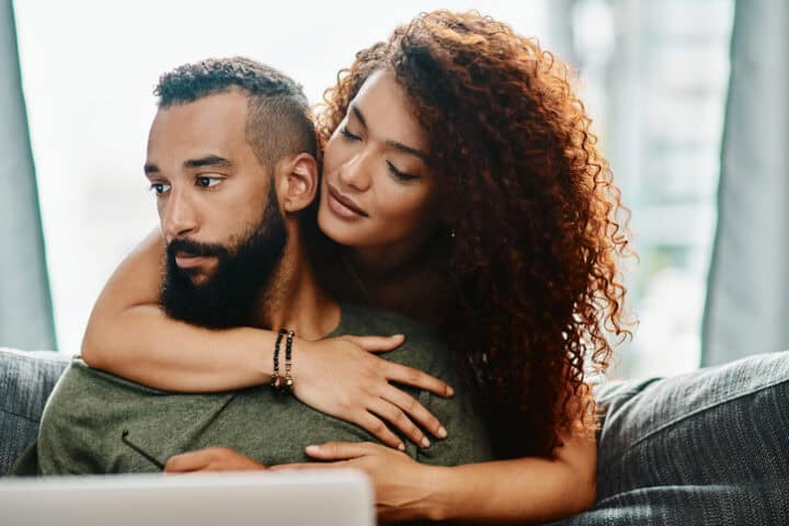 woman hugging man from behind