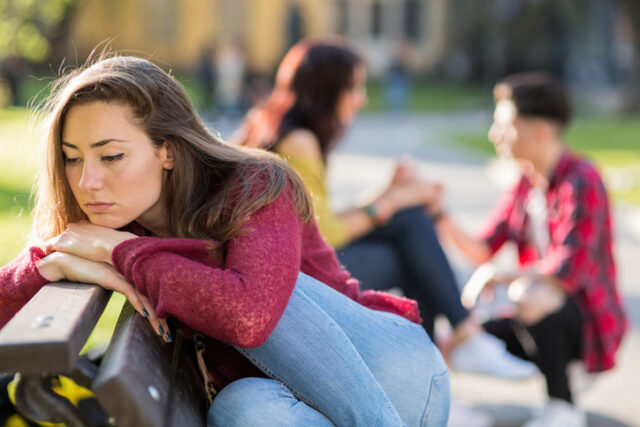 sad woman jealous of boyfriend