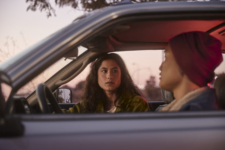 couple having series conversation in car