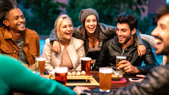 friends enjoying beer at winter brewery