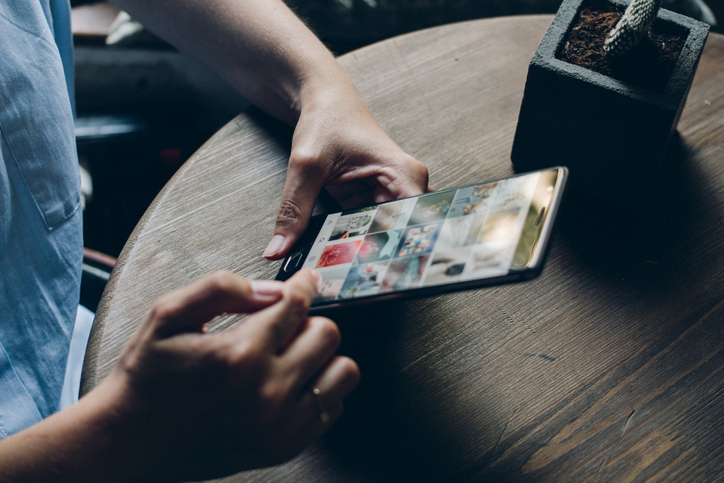 woman scrolling on her phone