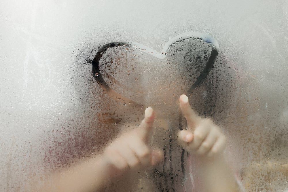 Couple in a steamy hot shower.