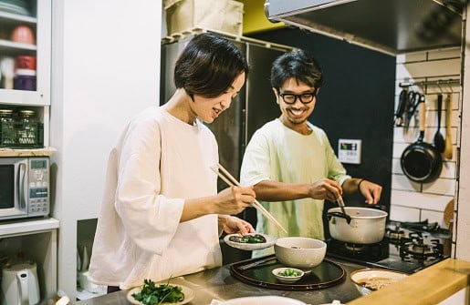 Couple cooking in the kitchen.