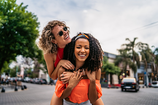 Two young smiling women in Buenos Aires, Argentina.