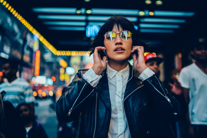 Woman walking in Times Square.