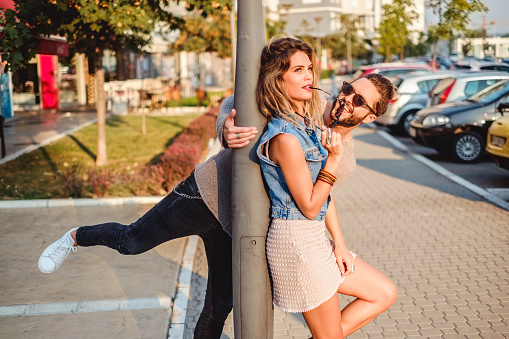 annoyed woman with amusing guy