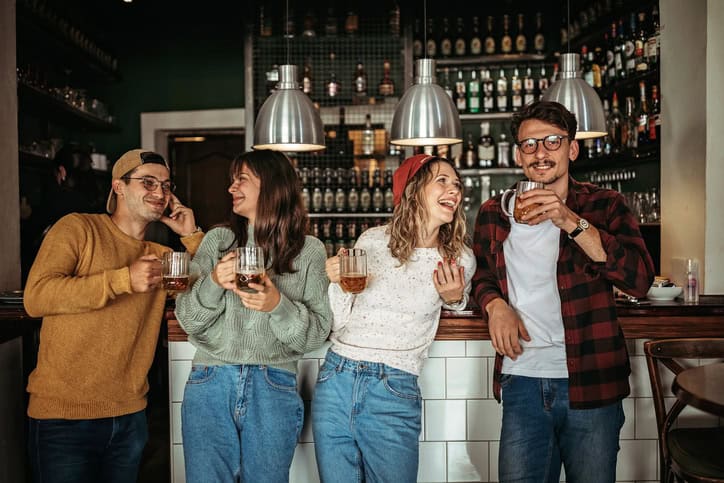 hipsters drinking at the bar
