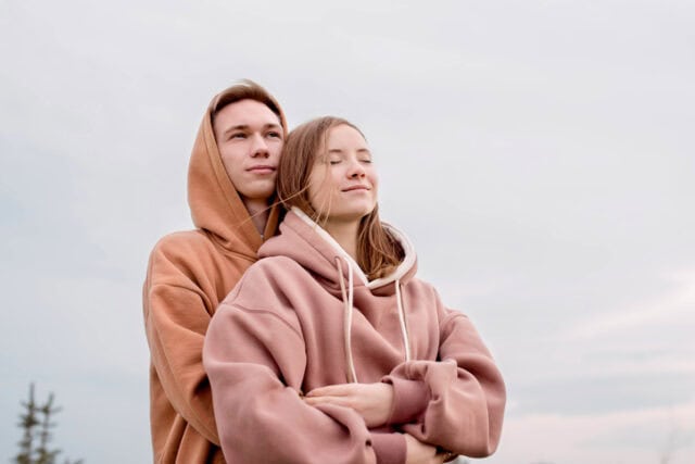 young couple embracing cold day