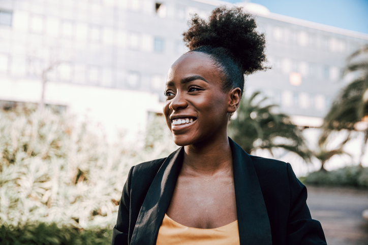 unique woman smiling sunny day