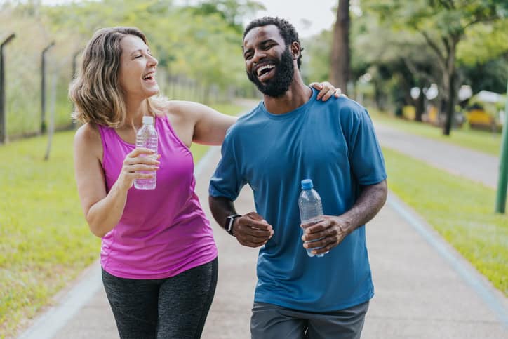 man woman going running together