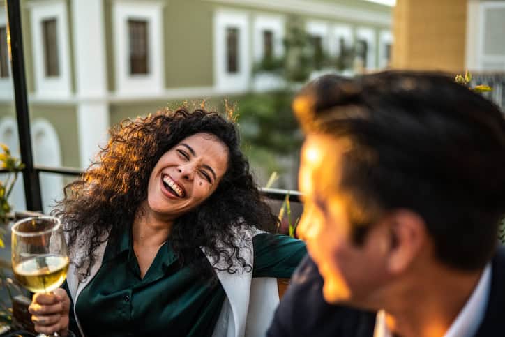 smiling couple laughing on date