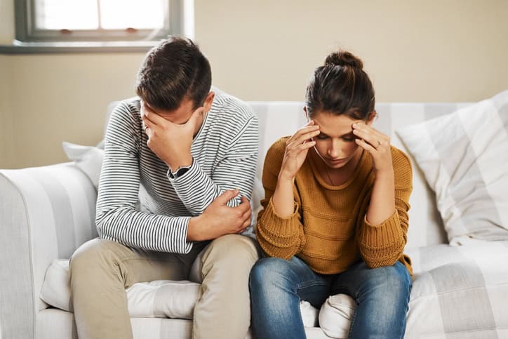 Cropped shot of a young couple having an argument at home