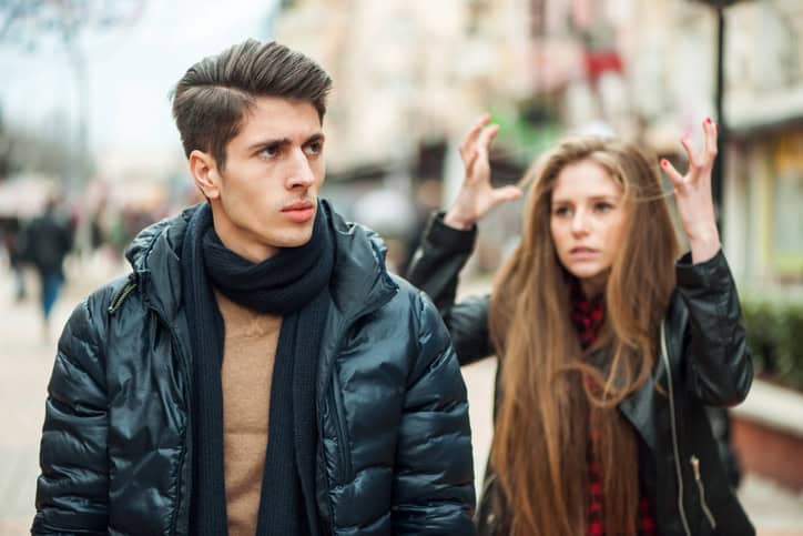 Couple fighting on the street.