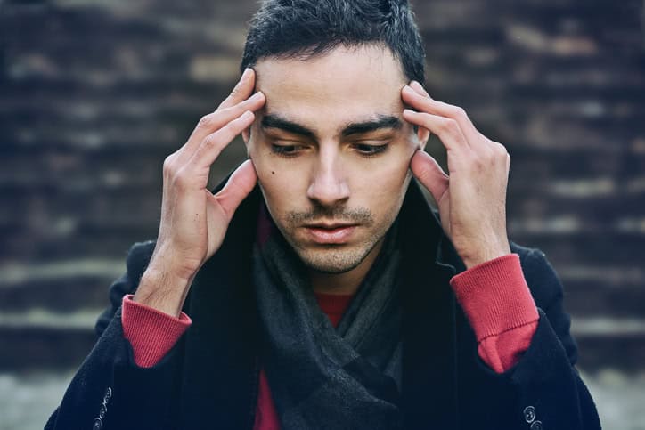 Sad Young Man outdoor. Everyday stress
