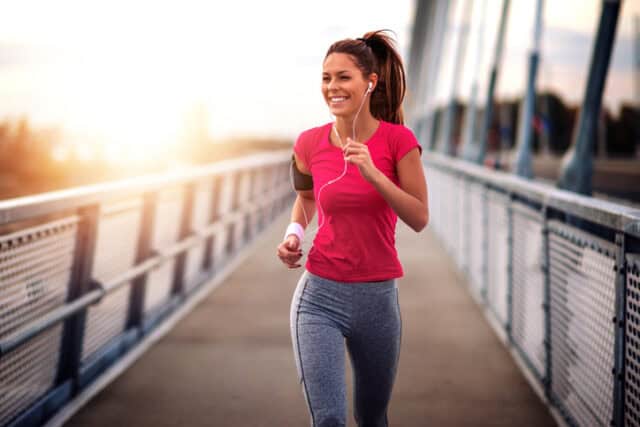 Fitness woman exercising outdoors