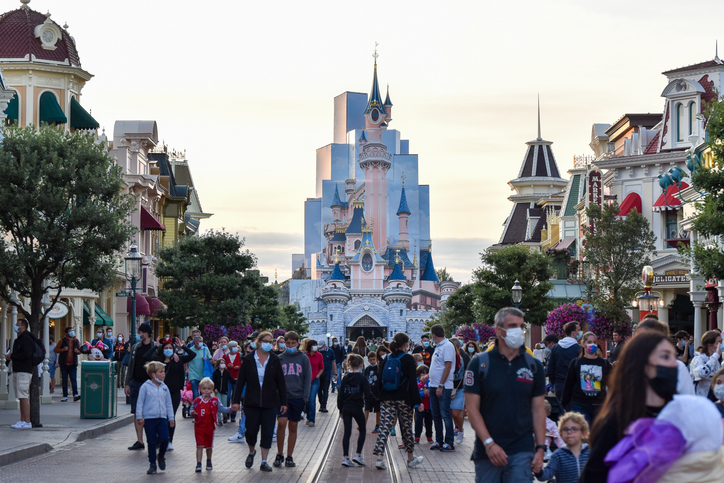 Disneyland park with tourists.