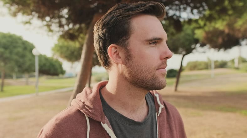 Portrait of a young man in the park