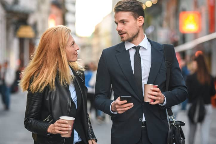 Young Career Couple on the Way to Work