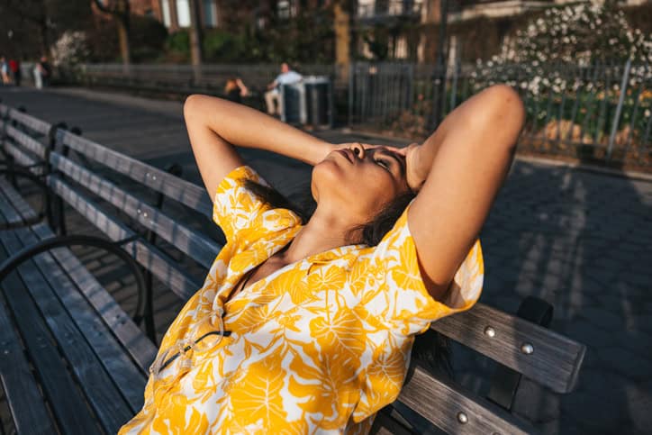 stressed woman on park bench