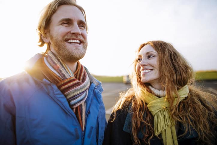 Couple in Love Waking Along the Coast
