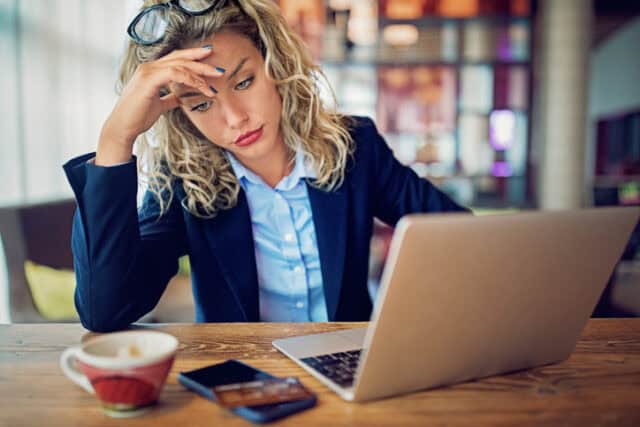 Burnout businesswoman with debt problems