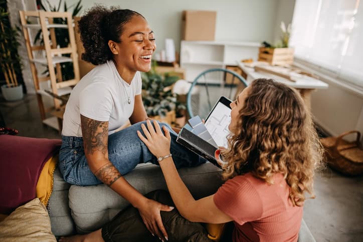 Roommates moving into a new home. Together they equip their space where they will live